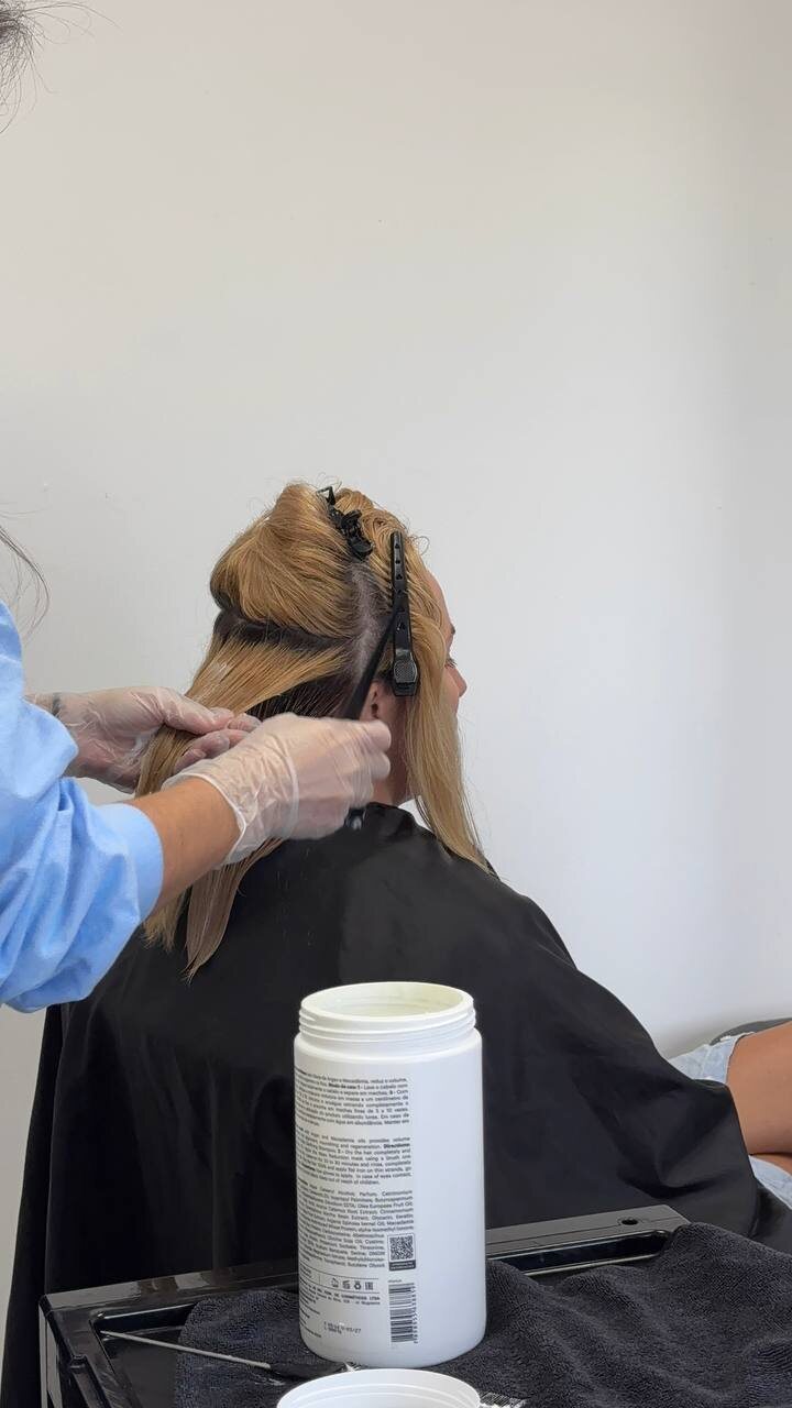 The formula brushed through the back sections