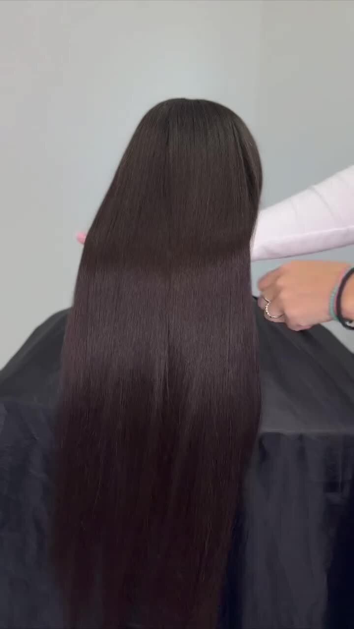 A comb running cleanly through smoothed hair