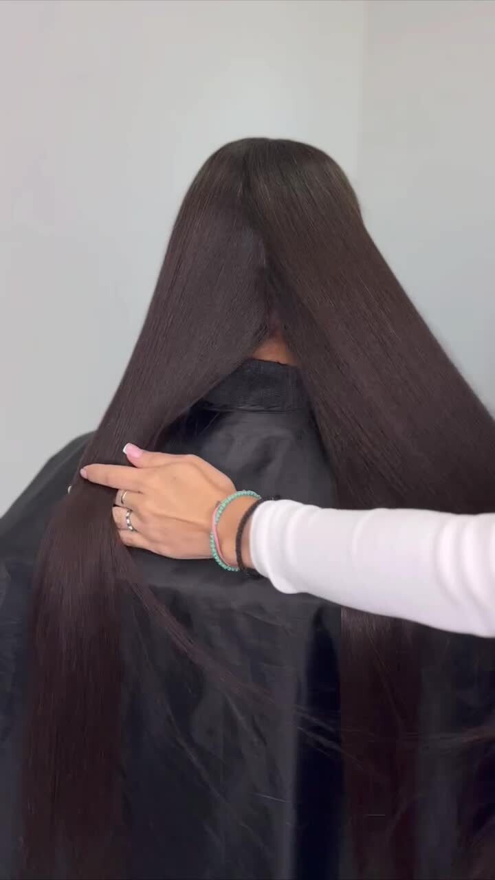 Very long dark hair, straight and glossy after nanoplasty
