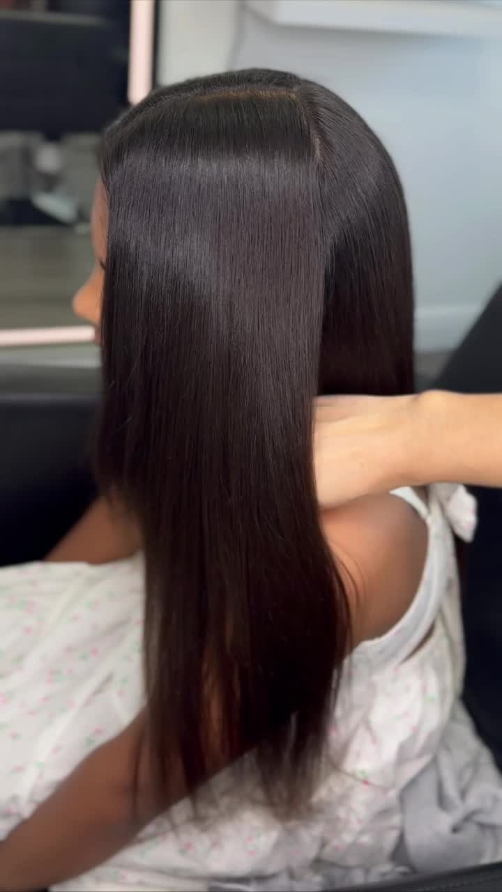 Mid length hair being combed through at the end of a visit
